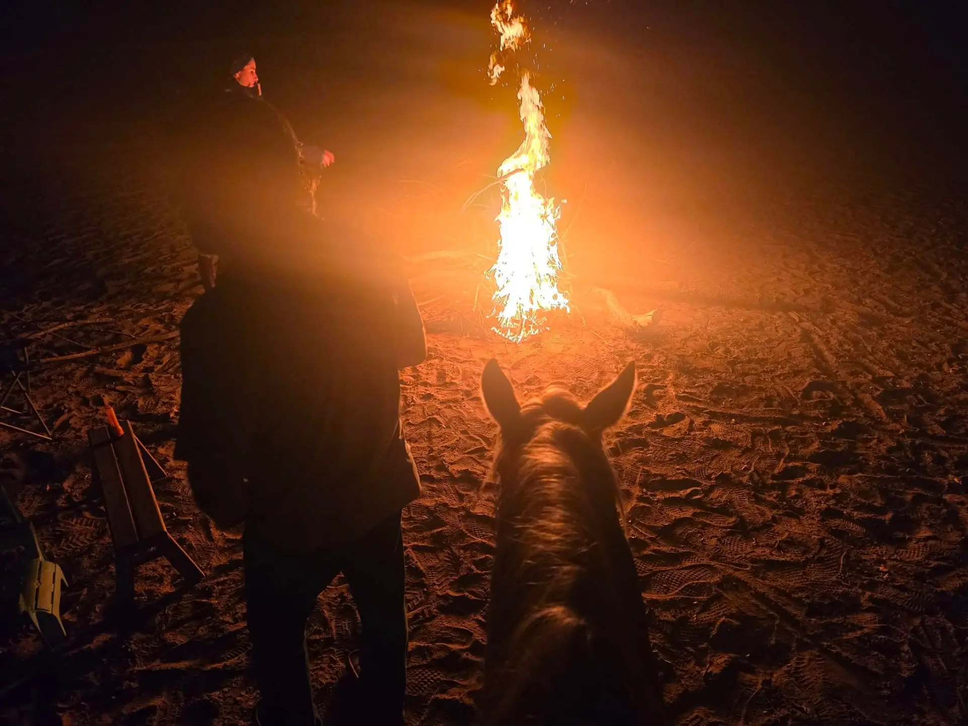 Evening on horseback by a campfire, shared by the shop's owner